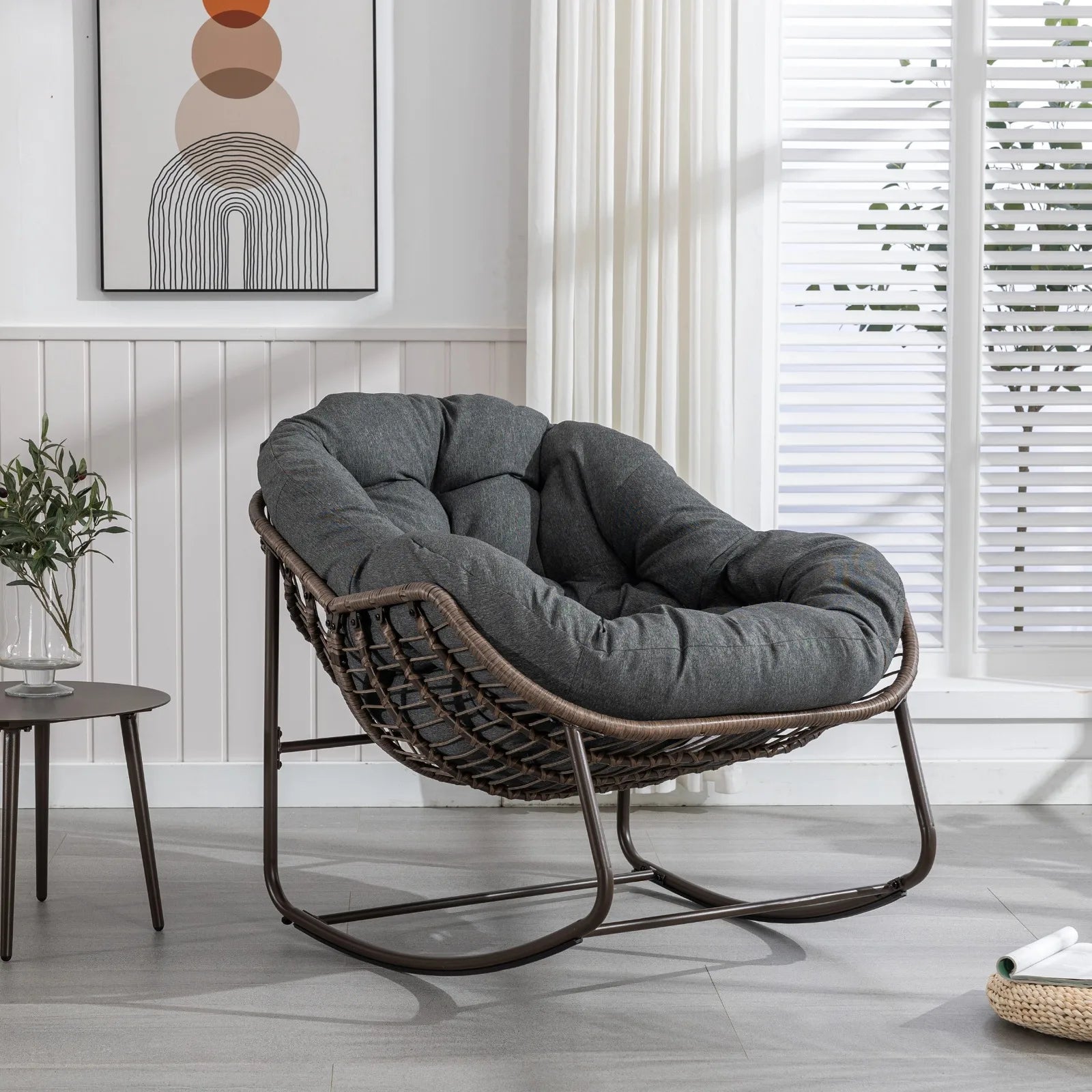 Fauteuil à bascule en rotin avec coussin