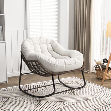 Fauteuil à bascule en rotin avec coussin