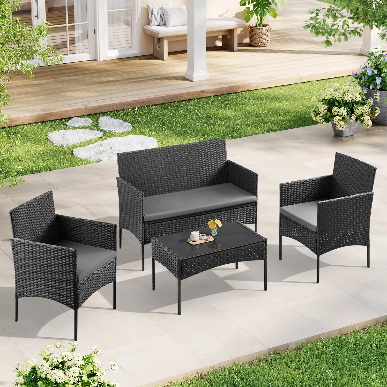 Salon de jardin en résine tressée 4 pièces avec table basse
