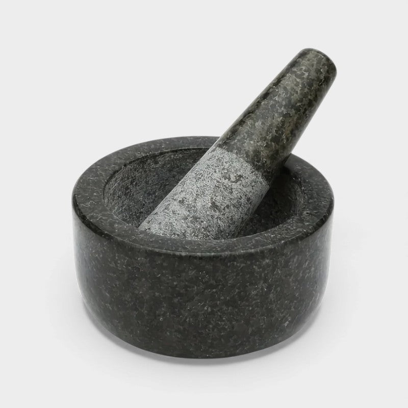 Mortier et pilon en granit poli