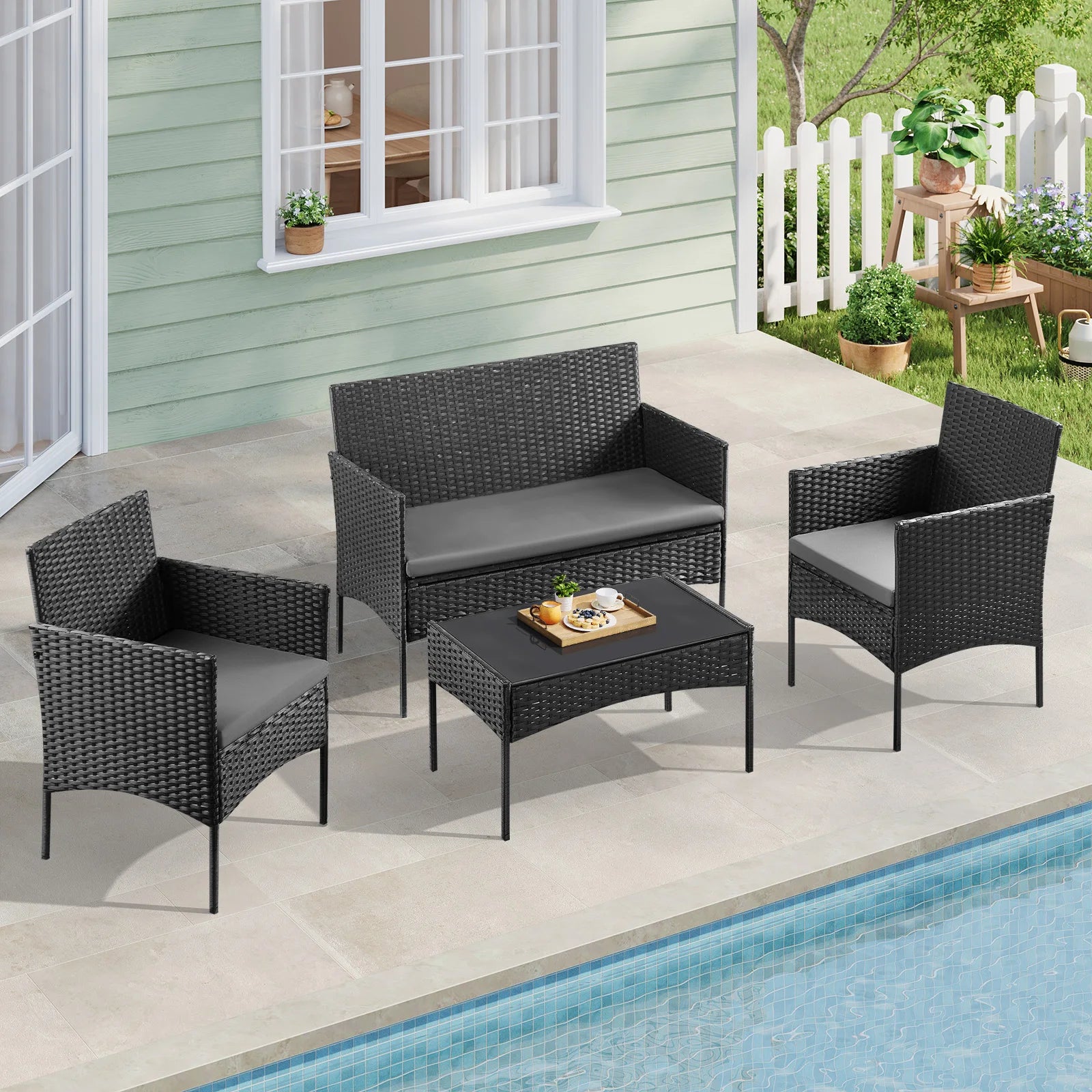 Salon de jardin en résine tressée 4 pièces avec table basse