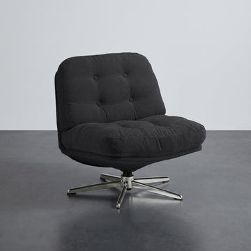 Fauteuil lounge pivotant capitonné