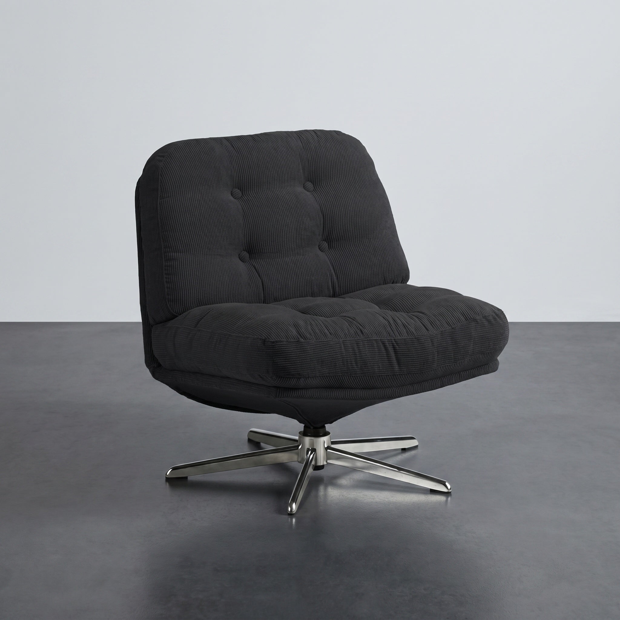 Fauteuil lounge pivotant capitonné
